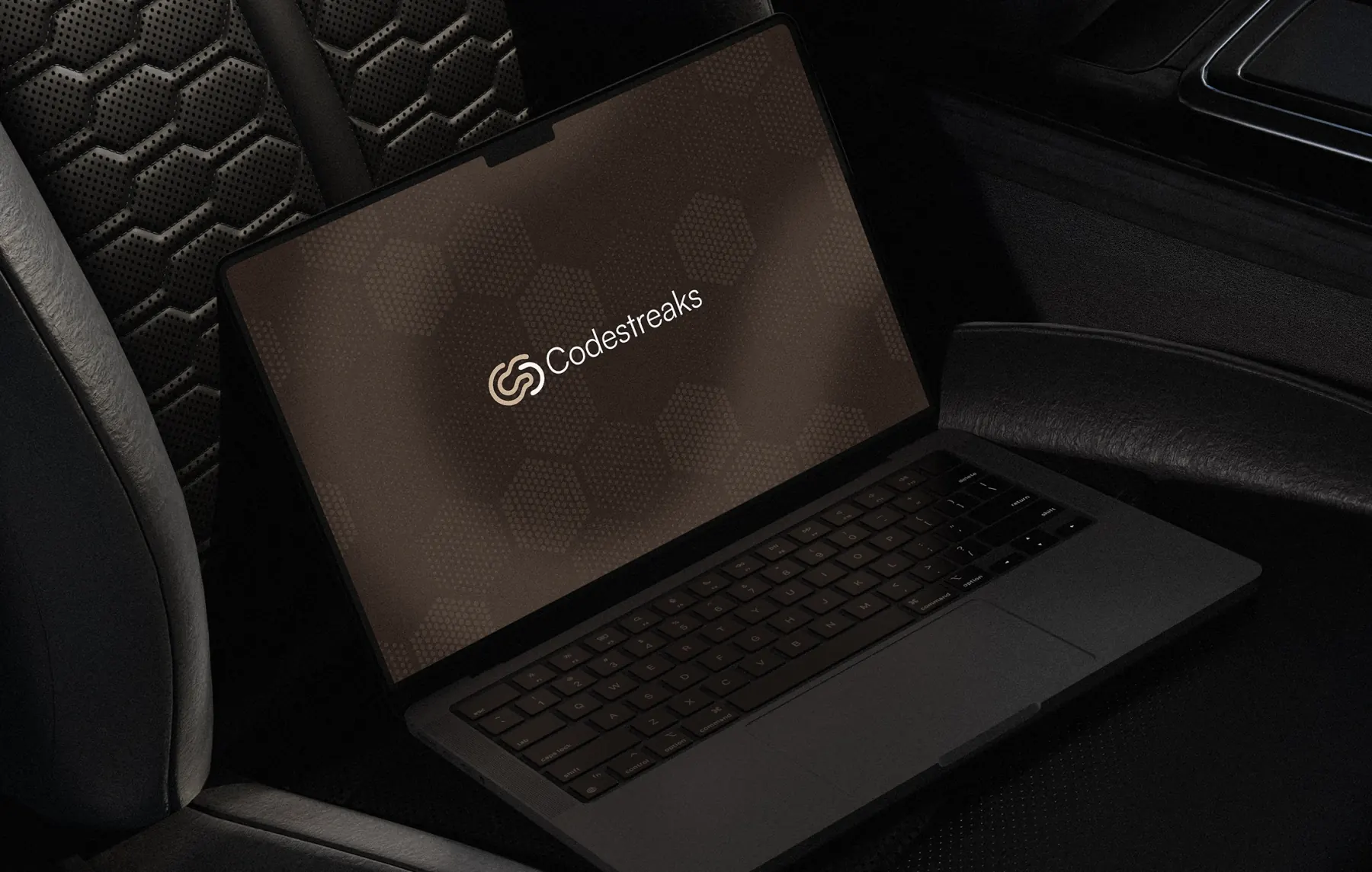Brand identity for CodeStreaks - mark applied across a dark studio environment