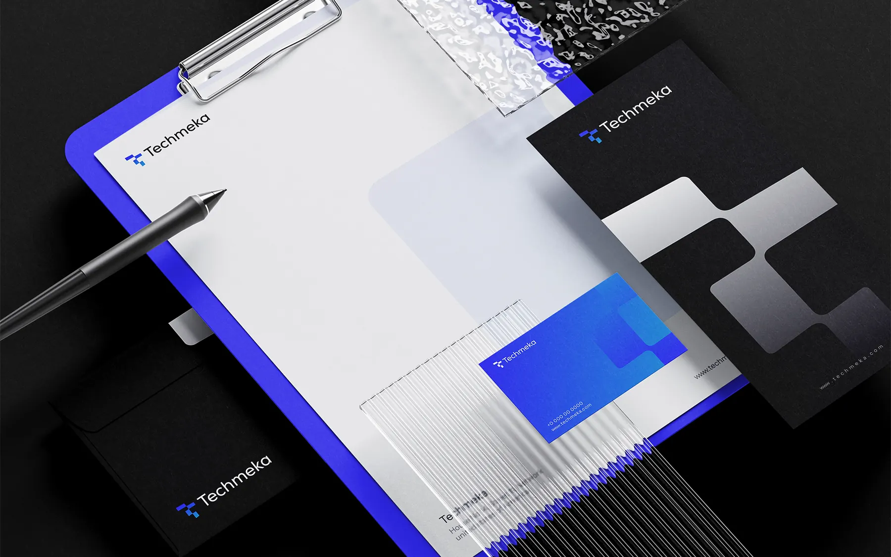 TechMeka statuinary with office, business card and other printed materials